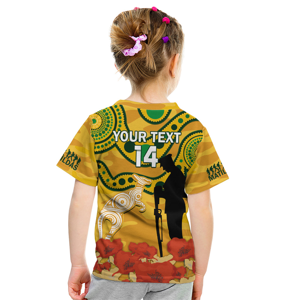 Custom Matildas ANZAC Day Kid T Shirt Lest We Forget Poppies Mix Camouflage Gold